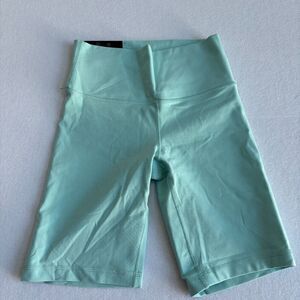 Aritzia TNA Atmosphere 9" Biker Short Women's S Green High Rise Sweat Wicking